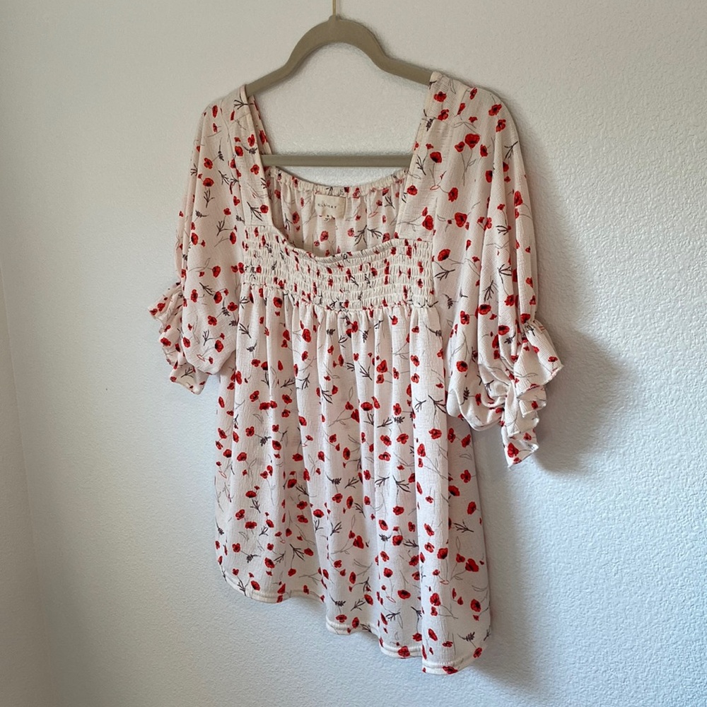 Meloday Cute and Flattering Flowered Top!